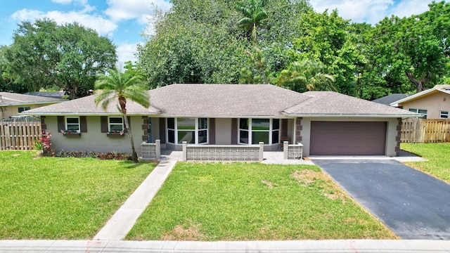 621 NW 71st Ave, Plantation, FL 33317 - single story home featuring covered porch, asphalt driveway, an attached garage, stucco siding, and a shingled roof