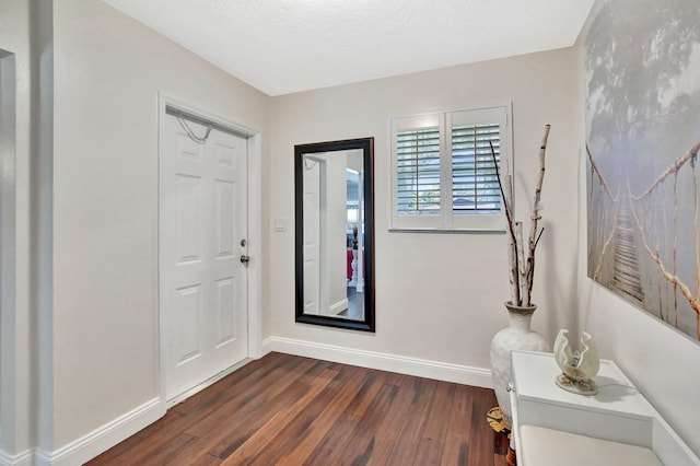 621 NW 71st Ave, Plantation, FL 33317 - entryway with baseboards and dark wood-style floors