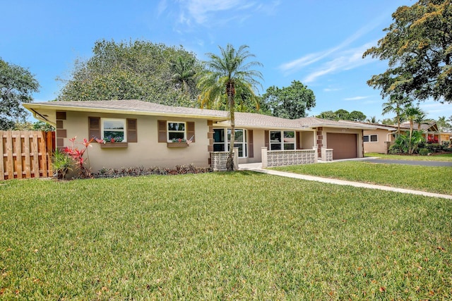 621 NW 71st Ave, Plantation, FL 33317 - ranch-style home with asphalt driveway, stucco siding, and an attached garage