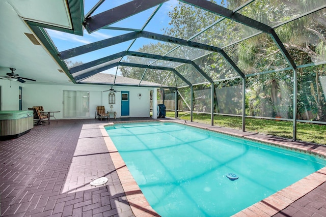 621 NW 71st Ave, Plantation, FL 33317 - outdoor pool with a ceiling fan, a patio area, and glass enclosure