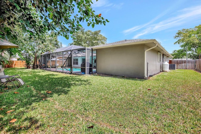 621 NW 71st Ave, Plantation, FL 33317 - back of house featuring stucco siding, glass enclosure, and cooling unit