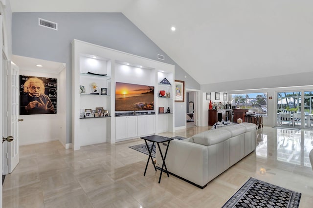 living room featuring visible vents, recessed lighting, and high vaulted ceiling