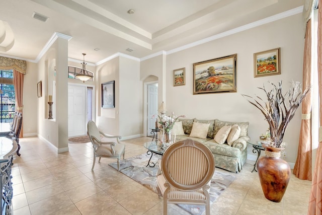 16211 Rosecroft Ter, Delray Beach, FL 33446 - living room featuring crown molding, arched walkways, visible vents, and light tile patterned floors