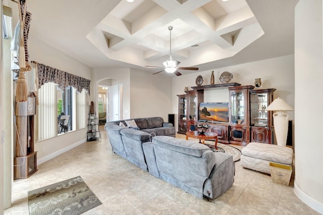16211 Rosecroft Ter, Delray Beach, FL 33446 - living room featuring arched walkways, a ceiling fan, baseboards, light tile patterned floors, and coffered ceiling