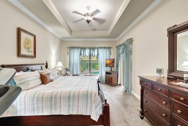 16211 Rosecroft Ter, Delray Beach, FL 33446 - bedroom with crown molding, light carpet, ceiling fan, access to outside, and a tray ceiling