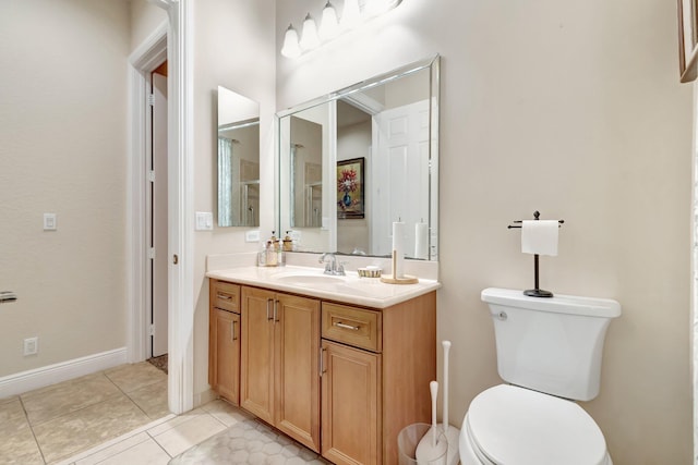 16211 Rosecroft Ter, Delray Beach, FL 33446 - bathroom featuring toilet, tile patterned floors, baseboards, and vanity