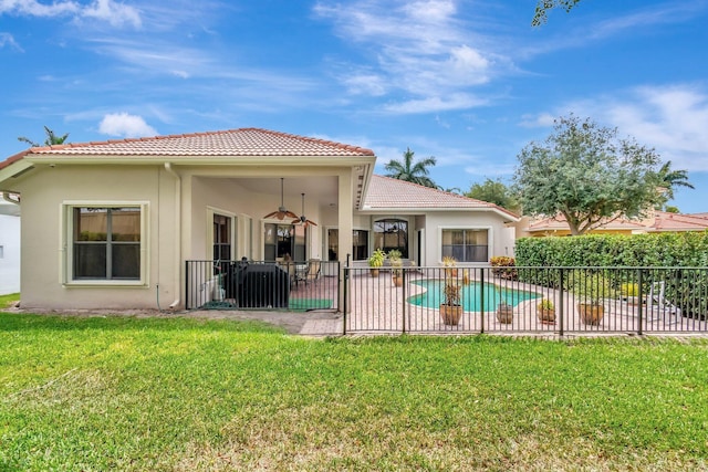 16211 Rosecroft Ter, Delray Beach, FL 33446 - back of property with fence, stucco siding, a patio area, and a tile roof