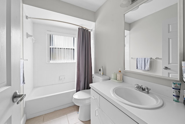 full bathroom featuring toilet, tile patterned flooring, shower / bath combo, and vanity