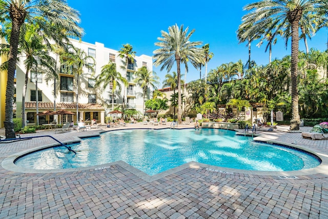 720 S Sapodilla Ave Unit 105, West Palm Beach, FL 33401 - community pool featuring a patio area