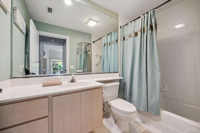 full bathroom with vanity, toilet, tile patterned floors, shower / bath combo with shower curtain, and visible vents