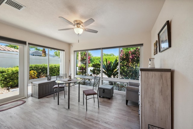 sunroom featuring visible vents