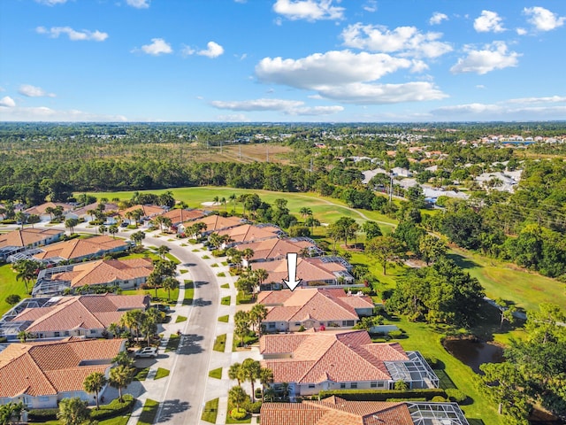bird's eye view with a residential view and golf course view