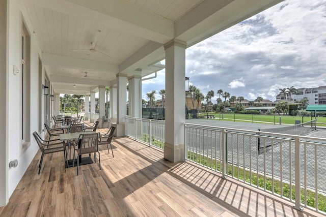 wooden terrace with a residential view