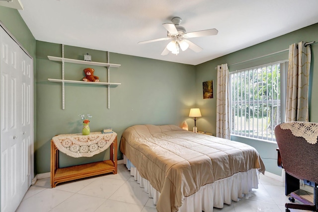 12820 87th St N, West Palm Beach, FL 33412 - bedroom featuring a closet, a ceiling fan, and baseboards