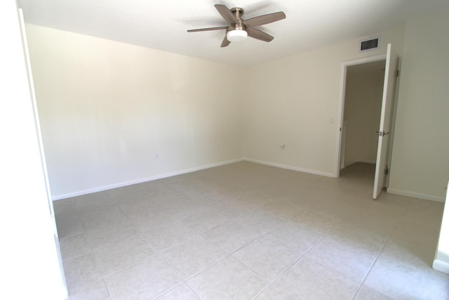 404 Live Oak Ln, Boynton Beach, FL 33436 - unfurnished room with visible vents, a ceiling fan, and baseboards