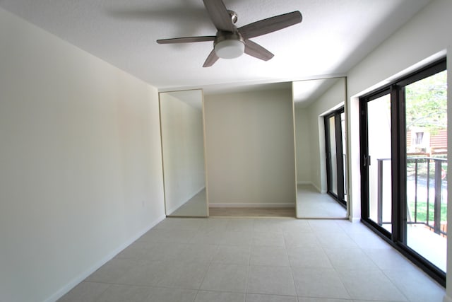404 Live Oak Ln, Boynton Beach, FL 33436 - spare room with ceiling fan and baseboards