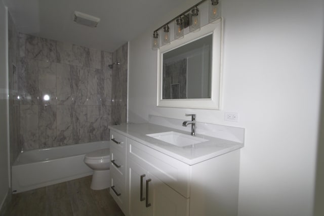 404 Live Oak Ln, Boynton Beach, FL 33436 - full bath with vanity, toilet, visible vents, shower / washtub combination, and wood finished floors