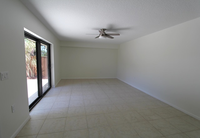 404 Live Oak Ln, Boynton Beach, FL 33436 - spare room with a ceiling fan, a textured ceiling, and baseboards