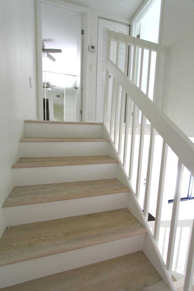 404 Live Oak Ln, Boynton Beach, FL 33436 - stairs featuring a ceiling fan and wood finished floors