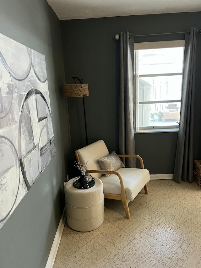 95 E E Ct, Royal Palm Beach, FL 33411 - sitting room featuring baseboards