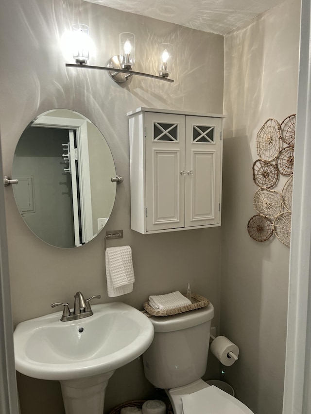 95 E E Ct, Royal Palm Beach, FL 33411 - bathroom with toilet and a sink