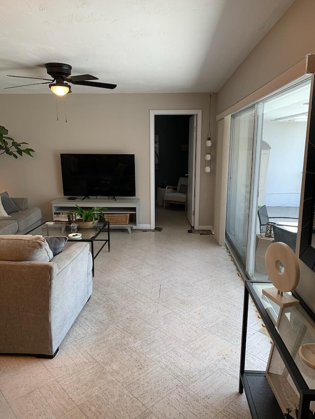 95 E E Ct, Royal Palm Beach, FL 33411 - living room featuring a ceiling fan