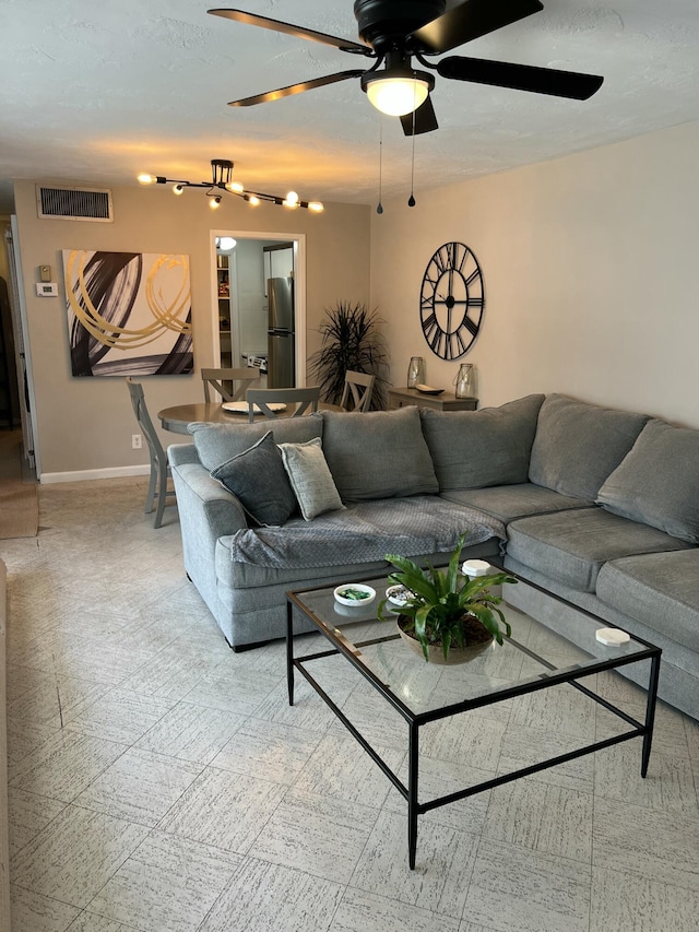 95 E E Ct, Royal Palm Beach, FL 33411 - living area with ceiling fan and baseboards