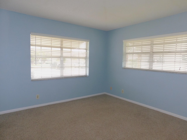 317 Colony Ln Unit A, Fort Pierce, FL 34982 - unfurnished room with carpet flooring and baseboards