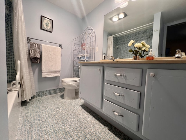 432 Grantham Unit B, Deerfield Beach, FL 33442 - bathroom featuring toilet, vanity, tile patterned flooring, and shower / bathtub combination with curtain