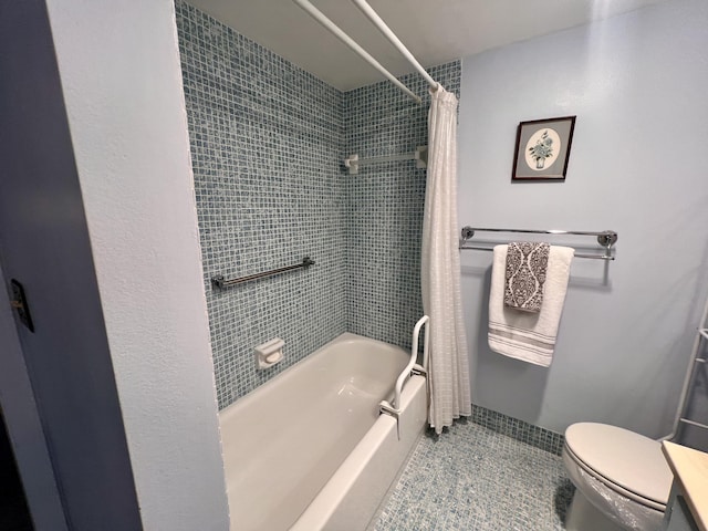432 Grantham Unit B, Deerfield Beach, FL 33442 - bathroom featuring shower / bath combo with shower curtain, tile patterned floors, and toilet