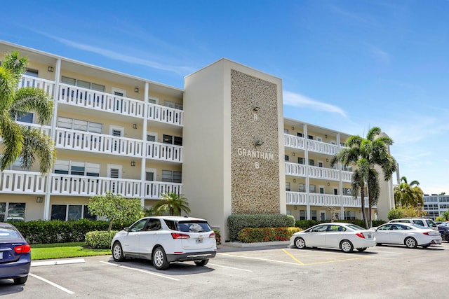 432 Grantham Unit B, Deerfield Beach, FL 33442 - view of apartment building / complex featuring uncovered parking