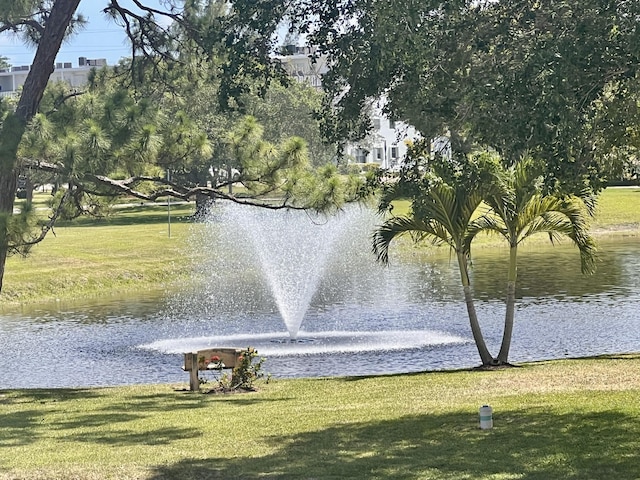 432 Grantham Unit B, Deerfield Beach, FL 33442 - view of community featuring a water view and a yard