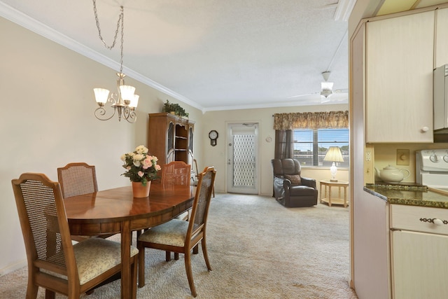 432 Grantham Unit B, Deerfield Beach, FL 33442 - dining area featuring ornamental molding, light colored carpet, a chandelier, and ceiling fan