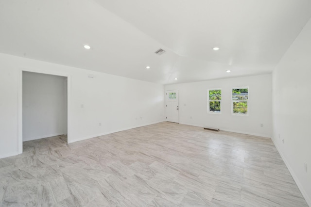 unfurnished room with recessed lighting, visible vents, and lofted ceiling