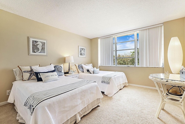 2121 N Ocean Blvd Unit 404W, Boca Raton, FL 33431 - bedroom featuring baseboards, carpet, and a textured ceiling