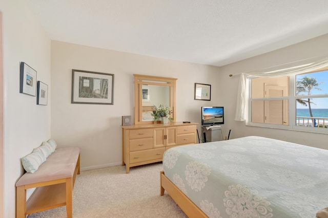3101 S Ocean Blvd Unit 220, Highland Beach, FL 33487 - bedroom with light carpet and baseboards