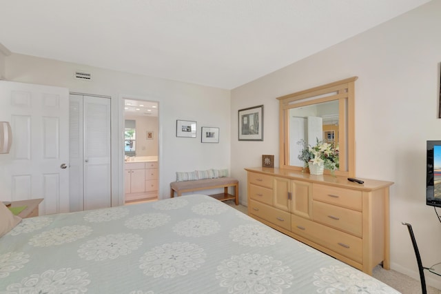 3101 S Ocean Blvd Unit 220, Highland Beach, FL 33487 - carpeted bedroom with baseboards and ensuite bathroom