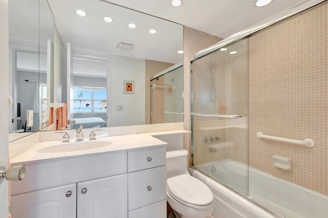3101 S Ocean Blvd Unit 220, Highland Beach, FL 33487 - ensuite bathroom with recessed lighting, toilet, vanity, and bath / shower combo with glass door