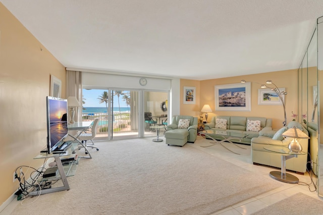 3101 S Ocean Blvd Unit 220, Highland Beach, FL 33487 - living room featuring carpet flooring and tile patterned flooring