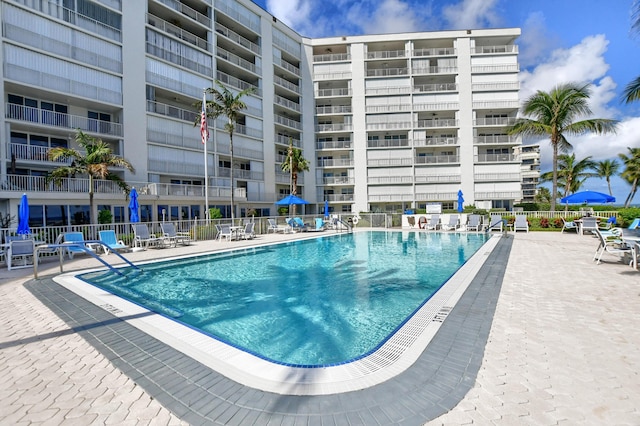 3101 S Ocean Blvd Unit 220, Highland Beach, FL 33487 - community pool with fence and a patio