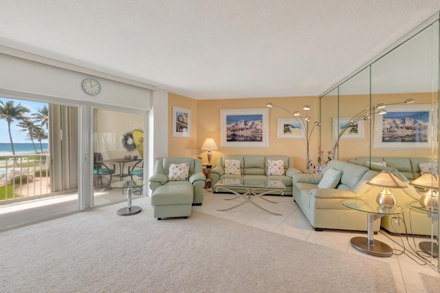 3101 S Ocean Blvd Unit 220, Highland Beach, FL 33487 - tiled living room with a water view