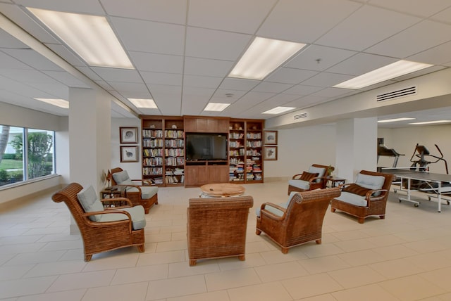 3101 S Ocean Blvd Unit 220, Highland Beach, FL 33487 - tiled living room with a drop ceiling