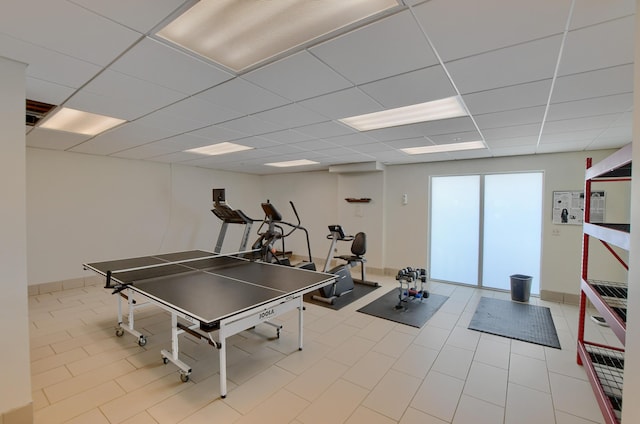 3101 S Ocean Blvd Unit 220, Highland Beach, FL 33487 - playroom featuring a paneled ceiling and tile patterned flooring