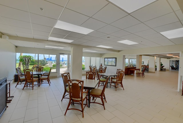 3101 S Ocean Blvd Unit 220, Highland Beach, FL 33487 - dining area featuring a drop ceiling and light tile patterned floors