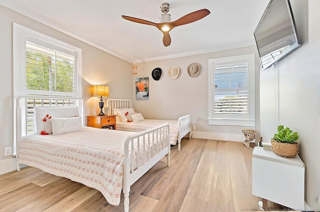 940 Turner Quay, Jupiter, FL 33458 - bedroom featuring ceiling fan, baseboards, ornamental molding, and wood finished floors