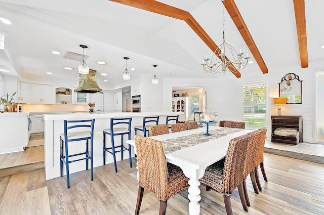 940 Turner Quay, Jupiter, FL 33458 - dining room with an inviting chandelier, lofted ceiling with beams, light wood-style flooring, and recessed lighting