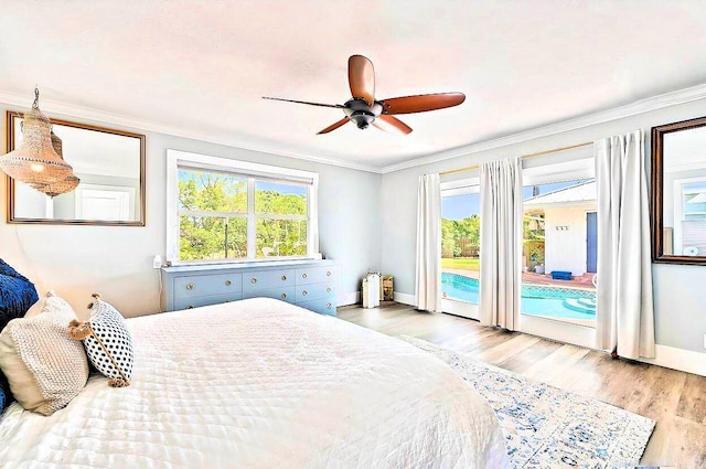 940 Turner Quay, Jupiter, FL 33458 - bedroom with crown molding, access to outside, baseboards, and wood finished floors