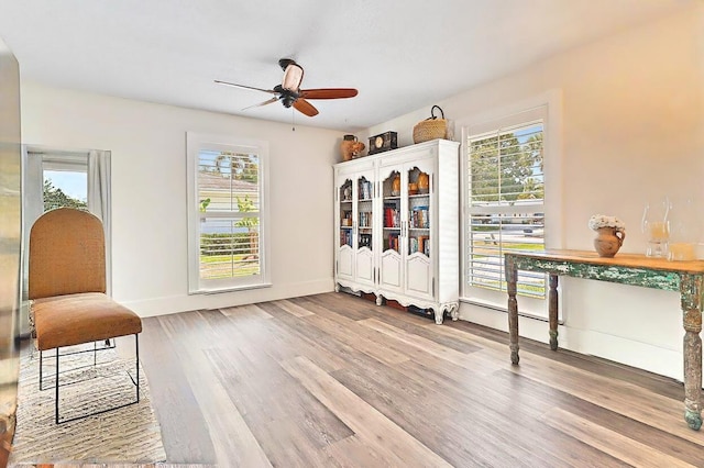 940 Turner Quay, Jupiter, FL 33458 - unfurnished room with ceiling fan, a healthy amount of sunlight, and wood finished floors