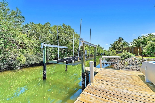 940 Turner Quay, Jupiter, FL 33458 - view of dock with a water view, fence, and boat lift