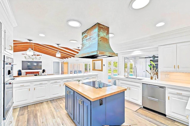 940 Turner Quay, Jupiter, FL 33458 - kitchen featuring stainless steel dishwasher, wooden counters, black electric stovetop, island exhaust hood, and lofted ceiling with beams